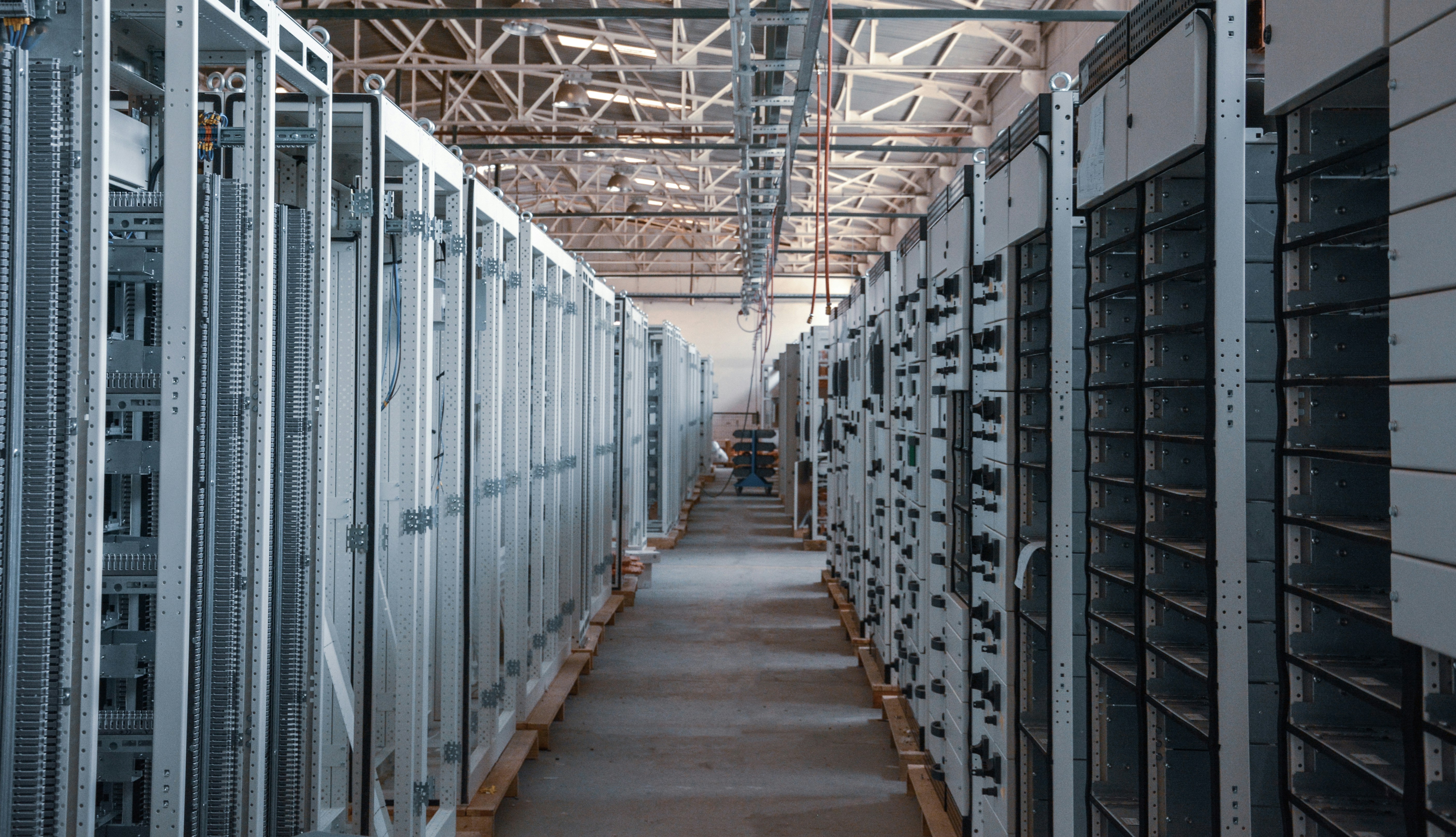 Engineers monitoring server infrastructure dashboards